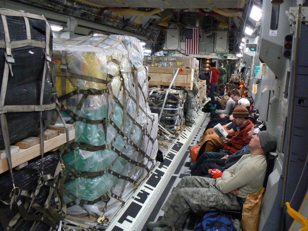 We sat along the walls with the cargo in the middle. Bring your earplugs.