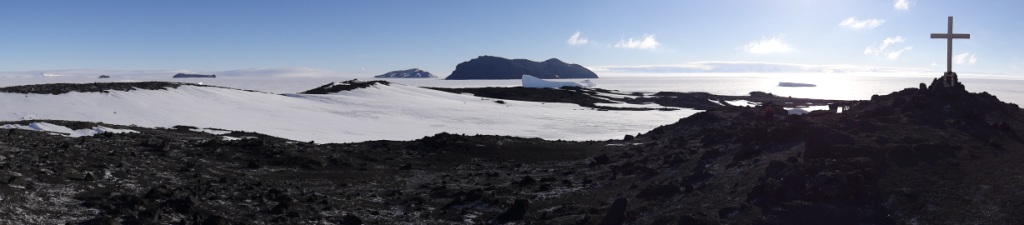 Panorama at Cape Evans including memoral cross for the men lost by Shackelton's Ross Sea party. Photo credit Pete Wilson.