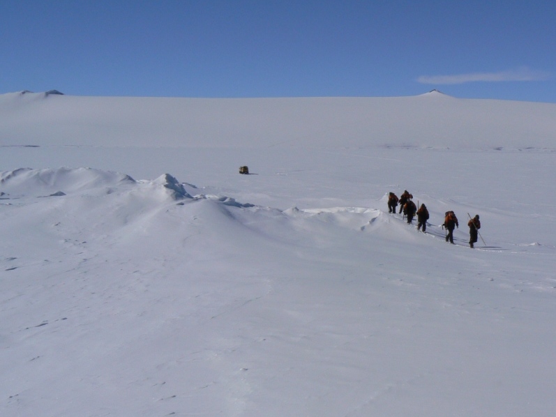 Walking across some cracks in the sea ice from the Hagglund to the seals